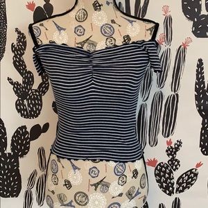 A navy blue and white off the shoulder top